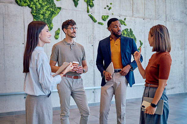 istock Businesspeople discussing new project in modern office with moss wall decoration 2226095890