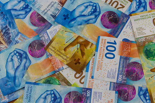 istock Background of the swiss francs banknotes 2226096799