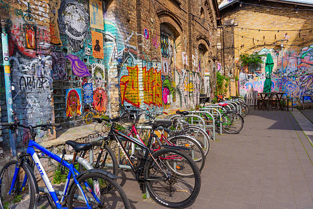 Bold graffiti art with vibrant neon blue, pink, green accents. Y2K, urban style, fluorescent colors, dynamic street vibe. Posters, flyers, creative projects, modern 90s, 2000s, Y2K aesthetic visuals.