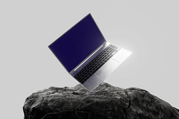istock A laptop is on top of a rock 2226101110