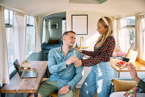 istock Friends Relaxing in a Cozy Bright Camper 2226108469