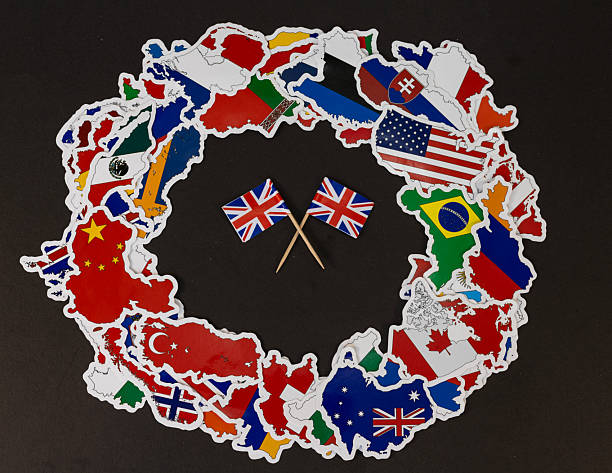 istock Global Unity Circle with British Flags in Center on Black Background 2226111244
