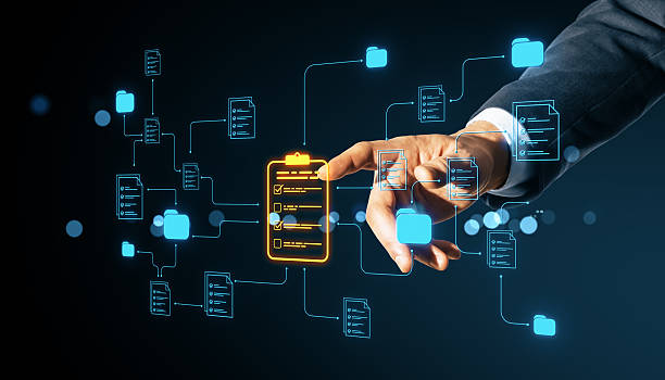 istock Business hand pressing digital checklist button among floating document and folder icons symbolizing online data management and cloud network structure. 2226112550