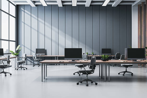 istock Modern empty office interior with computer desks and chairs in bright coworking workplace with corporate design and clean luxury workspace. 3D Rendering 2226112626