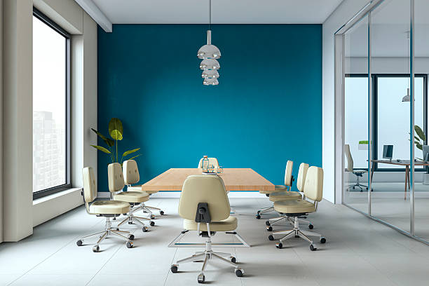 istock Modern corporate conference room interior with bright blue accent wall, glass partition, and city view through large windows. 3D Rendering 2226112734