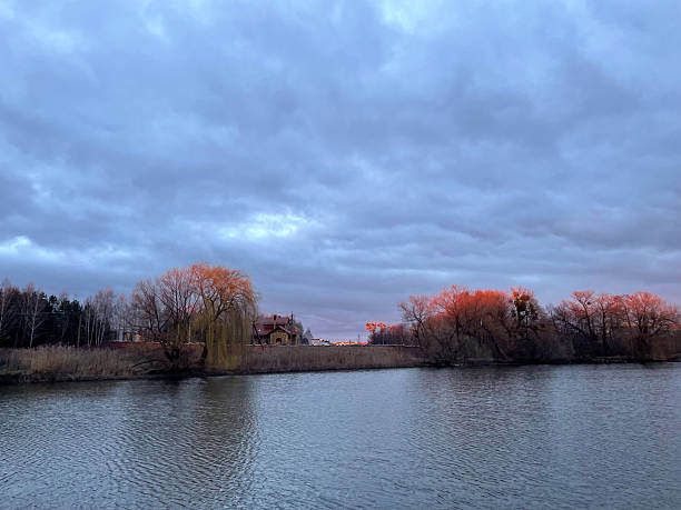 istock Tranquil river scene at dusk with vibrant autumn colors 2226114929