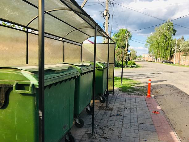 istock Garbage bins under shelter in urban street setting 2226115038