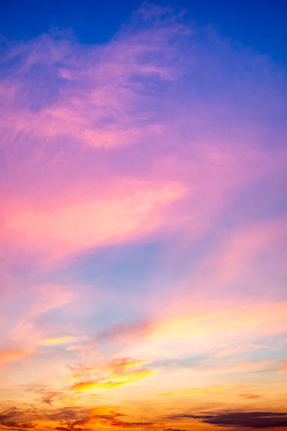 istock Beautiful , luxury soft gradient orange gold clouds and sunlight on the blue sky perfect for the background, take in evening,Twilight, Large size, high definition landscape photo,Vertical 2226119347