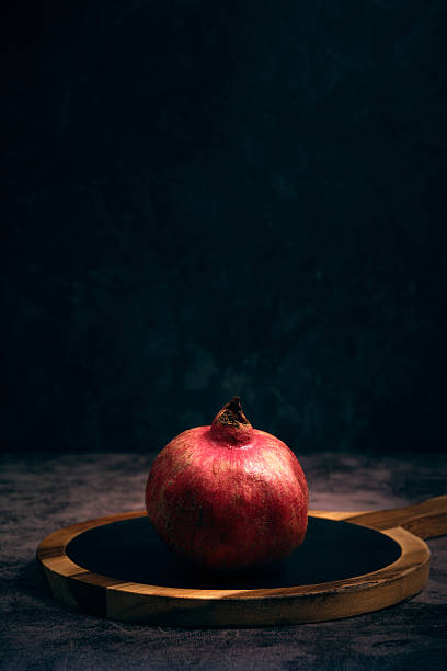 juicy pomegranate on a dark background