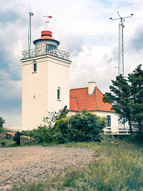 Hammerodde Fyr, Hammeren Lighthouse, cloudy sky, vertical