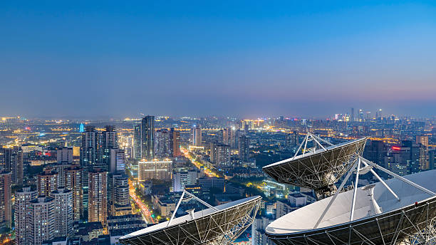 istock Ground satellite base stations and thriving city downtown areas 2226121542