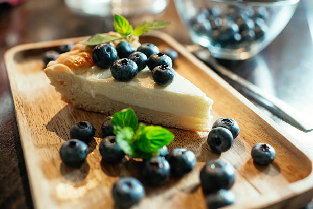 Slice of cake with blueberries at a kitchen