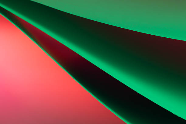 Colorful abstract curves in shades of green, red and gray creating a dynamic visual experience
