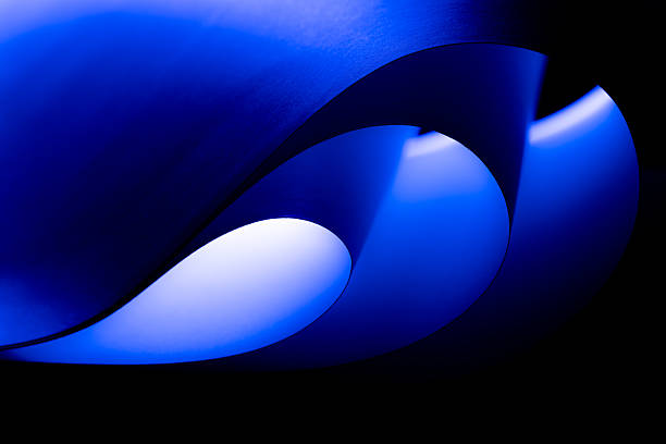 Colorful abstract curves in shades of blue tints and black creating a dynamic visual experience