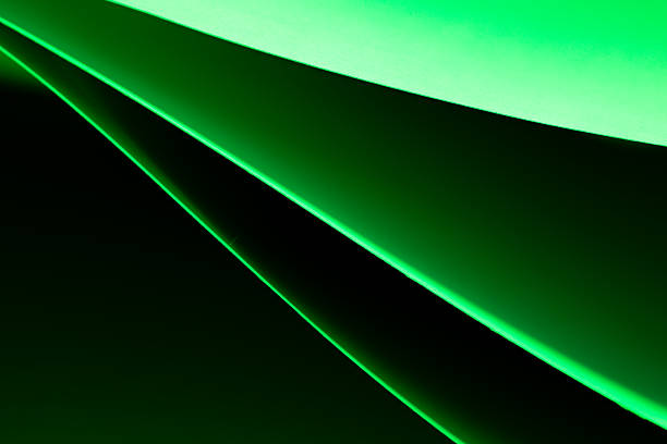 istock Colorful abstract curves in shades of green tints and black creating a dynamic visual experience 2226122994