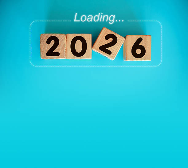 istock New Year 2026 with wood block isolated on blue 2226126074