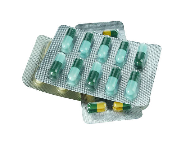 istock Bulk capsule pills blister packs isolated on white background. 2226127305