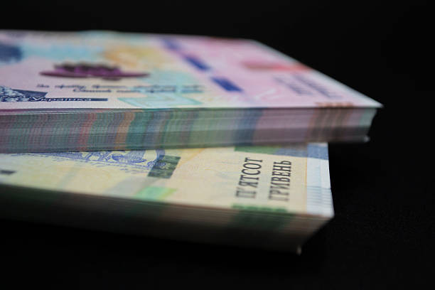 istock hryvna with 200 banknotes. 2226127550