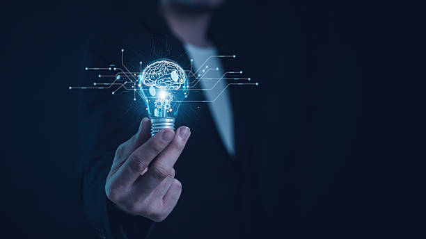 istock Hand of  holding illuminated light bulb, Idea innovation and inspiration concept.  creativity with bulbs that shine glitter, Concept for success. 2226133432