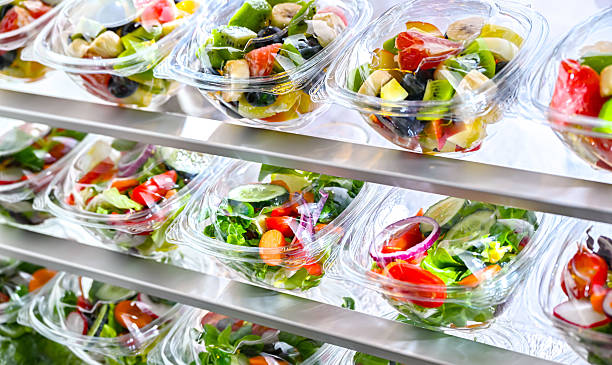 istock Boxes with fruit and vegetable salads in a commercial fridge 2226138334