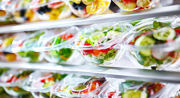 istock Boxes with fruit and vegetable salads in a commercial fridge 2226138354