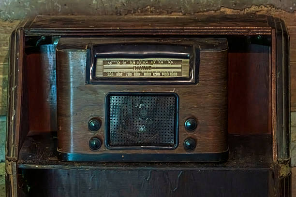 An old radio in cabinet
