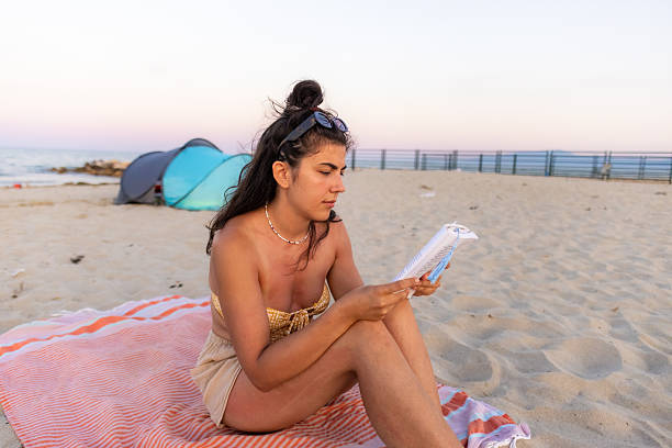 istock Young female nomad enjoying beach life 2226140343