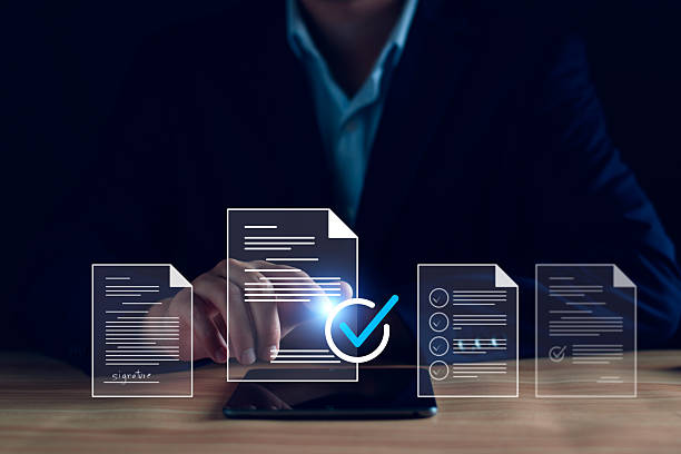 istock Manager is verifying the validity, security, approving requests, quality assurance, investment contracts. Online digital document work, paperless office. online survey. Checking mark up on check boxes 2226144972