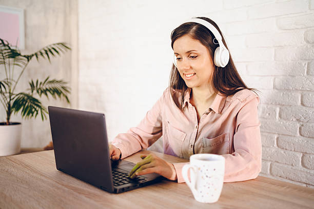 istock Cheerful woman working from home 2226146139