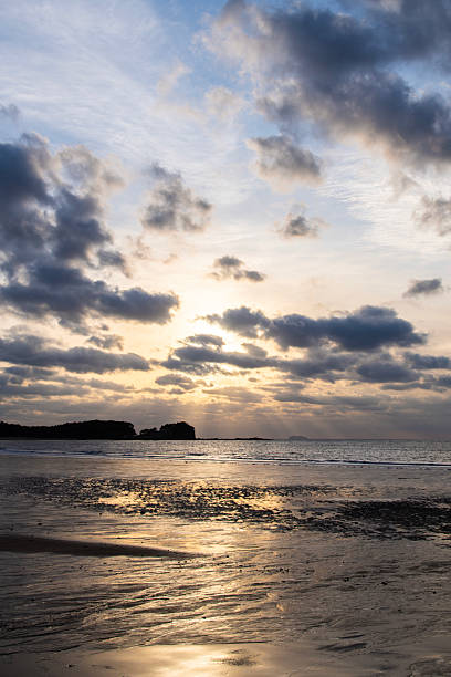 istock sunset view at the beach on a cloudy day 2226146425