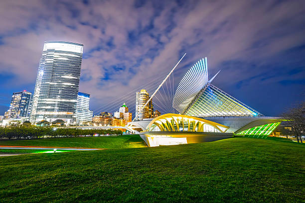 Milwaukee, WI, USA - April 30, 2025: Milwaukee Skyline Modern buildings Street View at Night