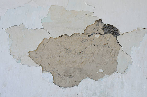 istock Old wall with peeling paint. Background and texture for design. 2226161545