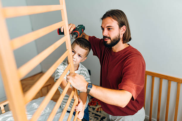 istock Preparing a crib for the baby 2226165857