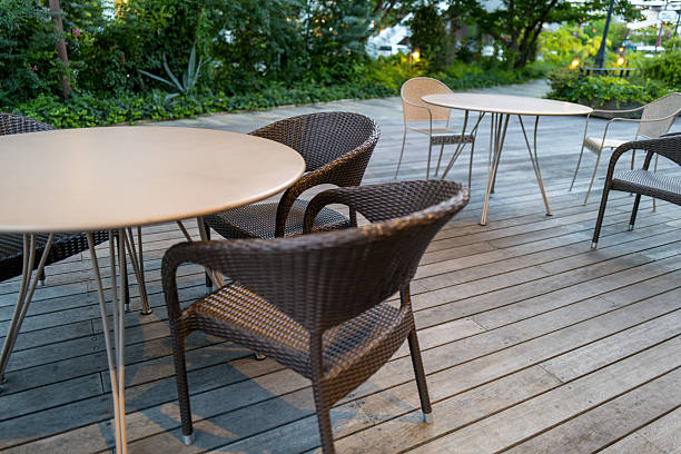 istock Cozy Terrace Seating Surrounded by Greenery 2226166715