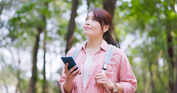istock Asian woman mobile hiking mountain 2226167648