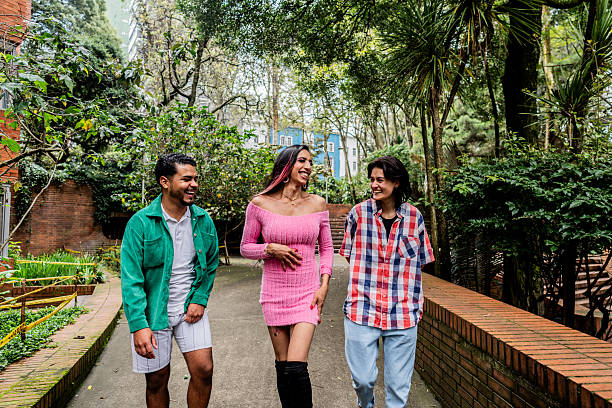 istock Young friends talking while walk outdoors 2226174853