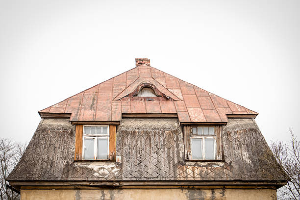 istock Weathered Roof with Old Windows on Rustic Building 2226177726