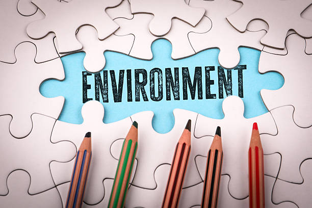 istock Environment. White puzzle pieces and colored pencils 2226177734
