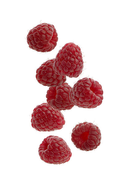 istock Raspberry with green leaves on white isolated background 2226178101