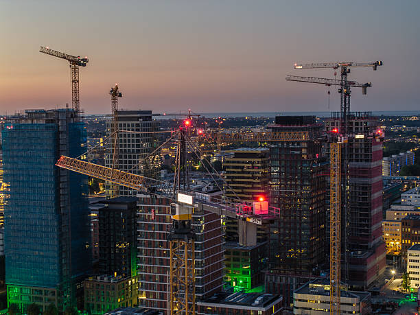 istock Construction cranes dominate Amsterdam South skyline at dusk 2226184365