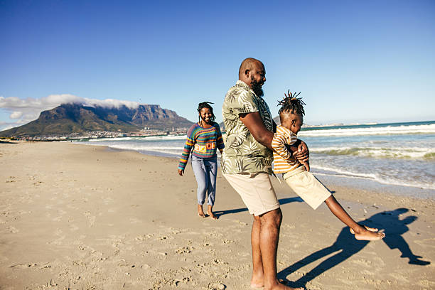 istock Quality Time: Dad Leads the Fun on the Shore 2226190096