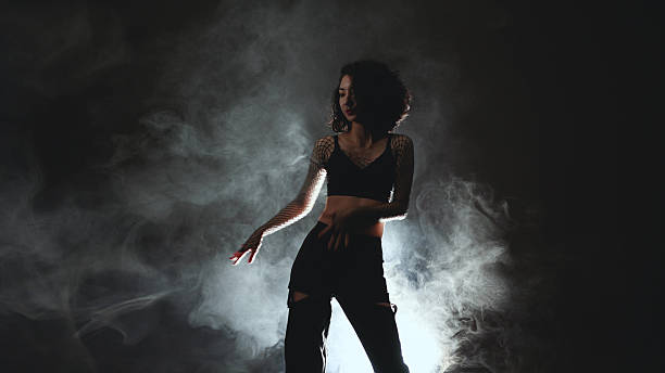 istock Atmospheric dance performance - female dancer in heels executing fluid movements 2226191882