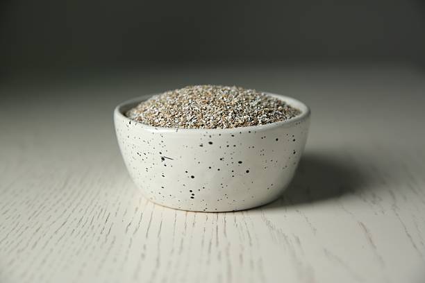 istock Fresh rye bran in bowl on light wooden table 2226192118