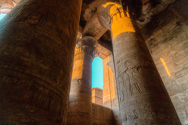 Woman walking in Temple of Philae aka Temple of Isis in Aswan Egypt,Agilkia Island