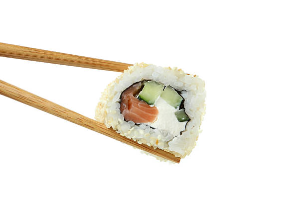 istock Chopsticks with roll isolated on white background 2226216816