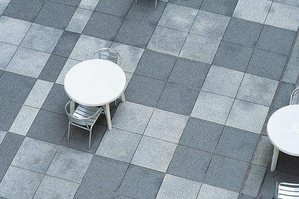 istock White Round Table and Chairs with Tiled Floor 2226217850