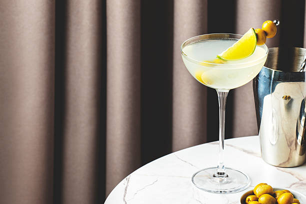 istock refreshing Mexican Martini with olives and lime in a cozy cocktail lounge setting 2226220787