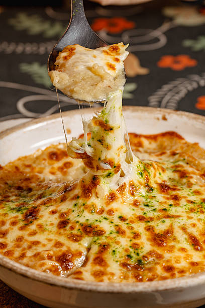 istock Delicious Cheesy Baked Rice with Melted Cheese and Herbs 2226222887
