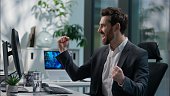 happy-caucasian-adult-man-working-with-computer-pc-reading-good-news-victory-winner-male.jpg?b=1&s=170x170&k=20&c=9O3fHAbGiXr6Y1W-2ZpKOCOuSMgqT8x--jfH3AeTaeg=