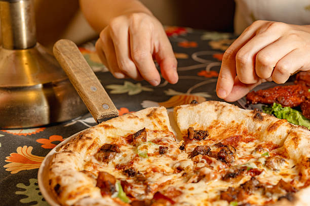 istock Enjoying a Delicious Pizza Moment 2226223172